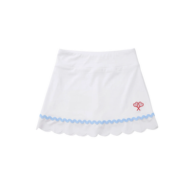 White skirt with blue trim and red heart design on a white background