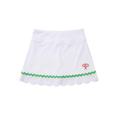White skirt with green trim and red heart design on a white background