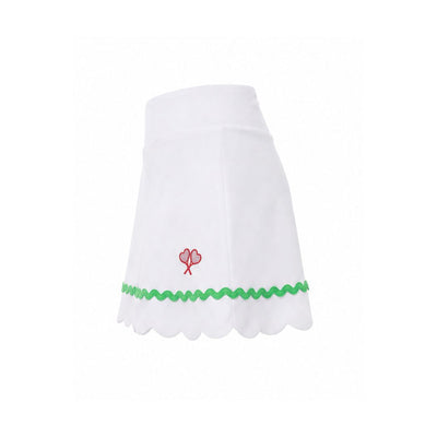 White skirt with green trim and red flower design on a white background