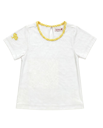A white short-sleeve baby tee with a yellow braided trim around the crew neck and a small yellow embroidered crossed heart tennis rackets on the left sleeve, shown flat on a white background.
